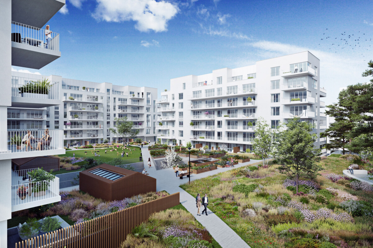 Immeubles modernes blancs entourant un espace vert avec des plantes, des arbres et des personnes se promenant, à City Dox.